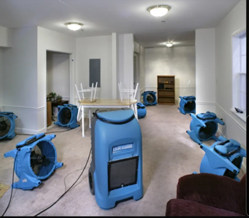 Air movers and dehumidifier setup for Water Extraction & Removal in Graham